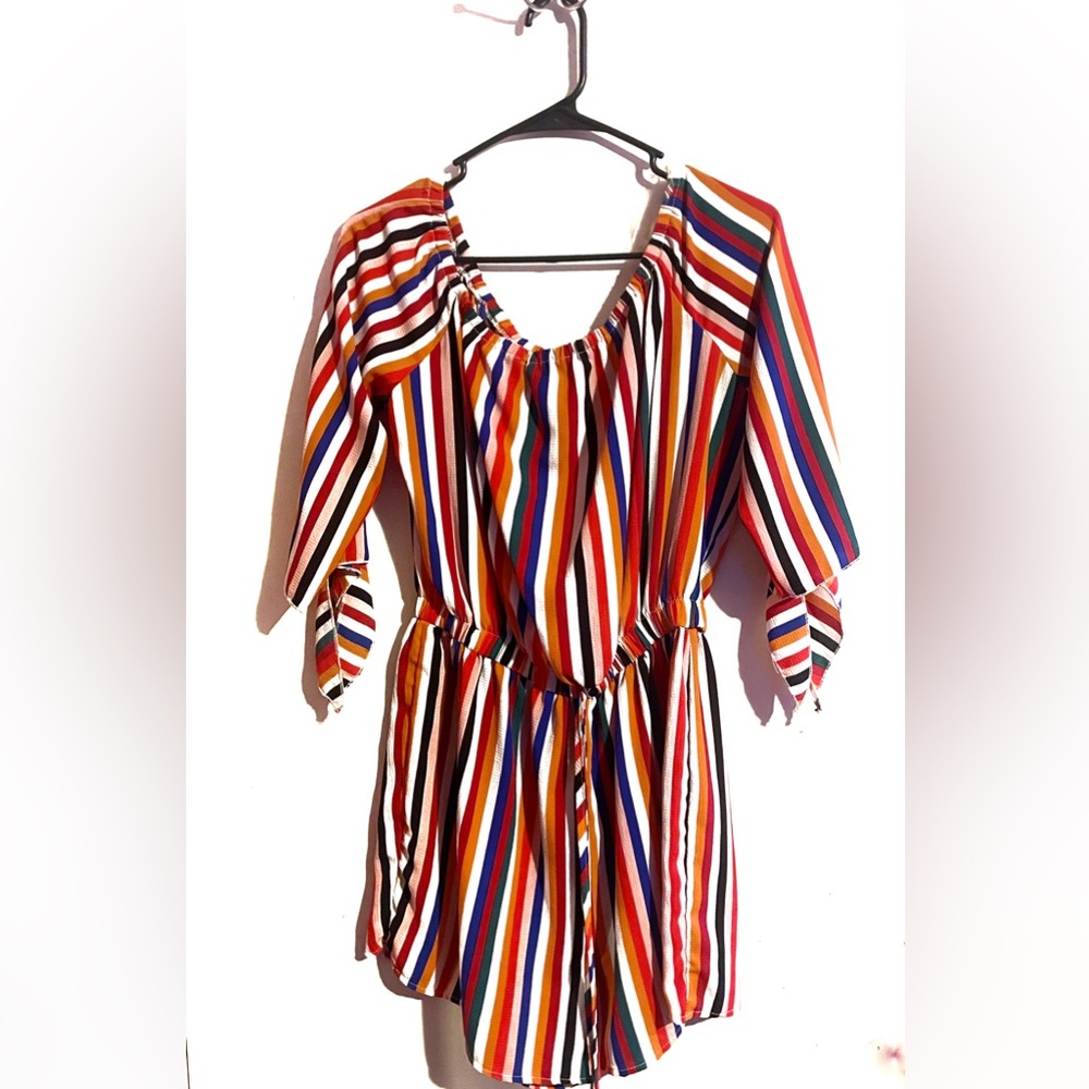 Step into spring with this multicolored romper.